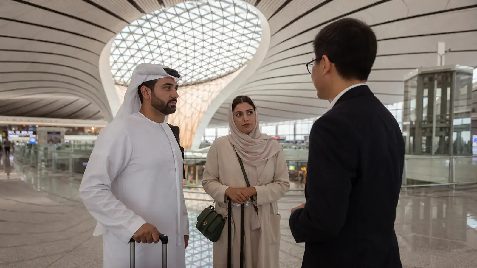 UAE couple meeting a chauffeur inside Beijing Daxing International Airport