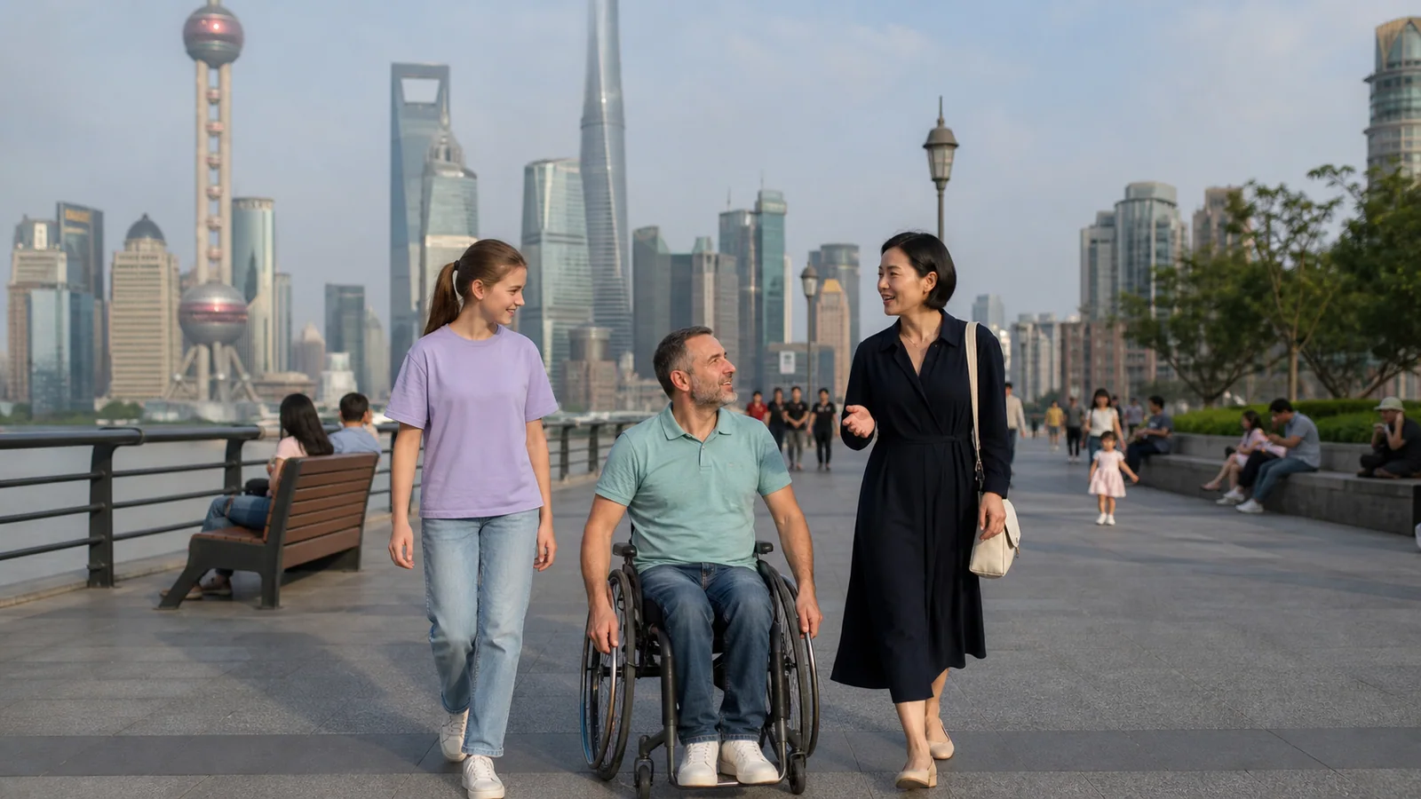 Wheelchair user exploring the Shanghai Bund with family and a private guide