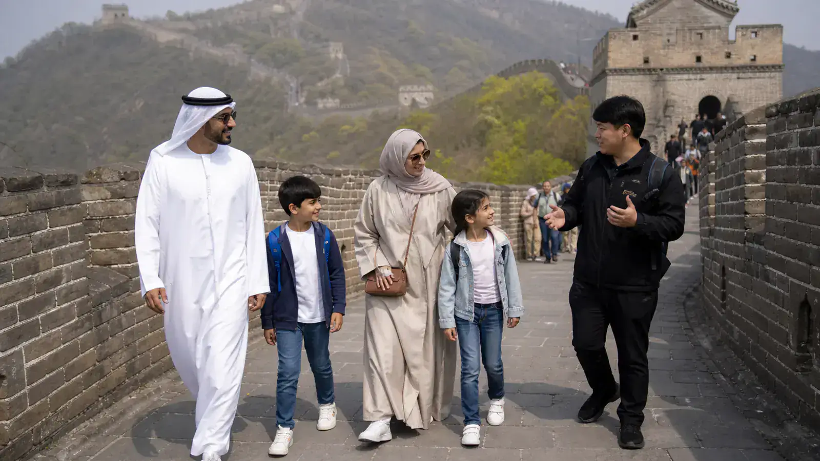 Gulf family exploring the Mutianyu Great Wall with a private Chinese guide