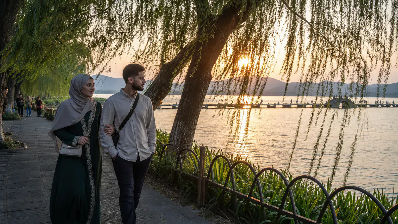 Middle Eastern honeymoon couple walking beside Hangzhou West Lake