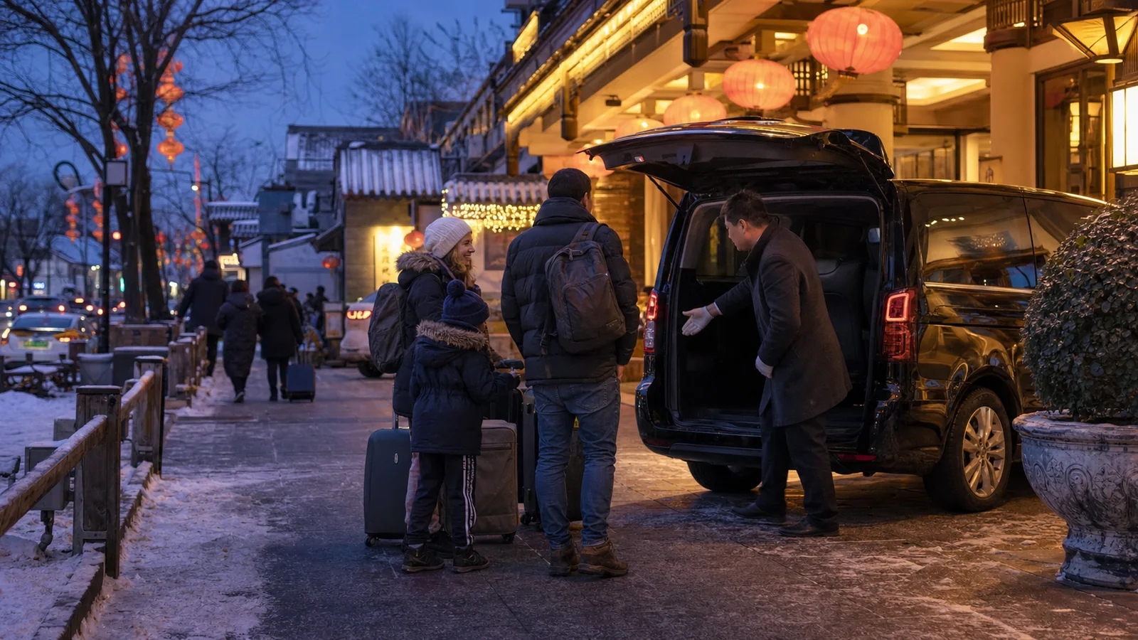 International family arriving at a Beijing hotel with a chauffeur during Chinese New Year