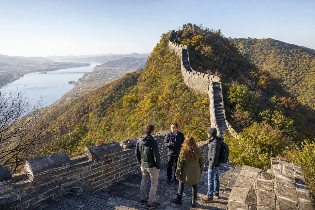 International travelers walking on the Hushan Great Wall near Dandong in autumn