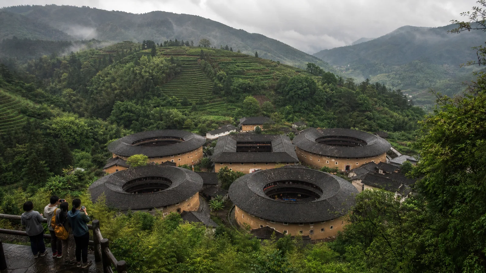 Tianluokeng tulou cluster in the green mountains of Fujian after rain