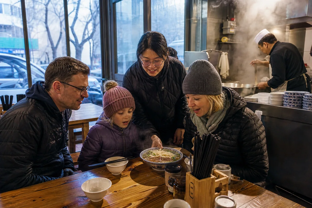 International family eating breakfast in a local Lanzhou beef noodle shop