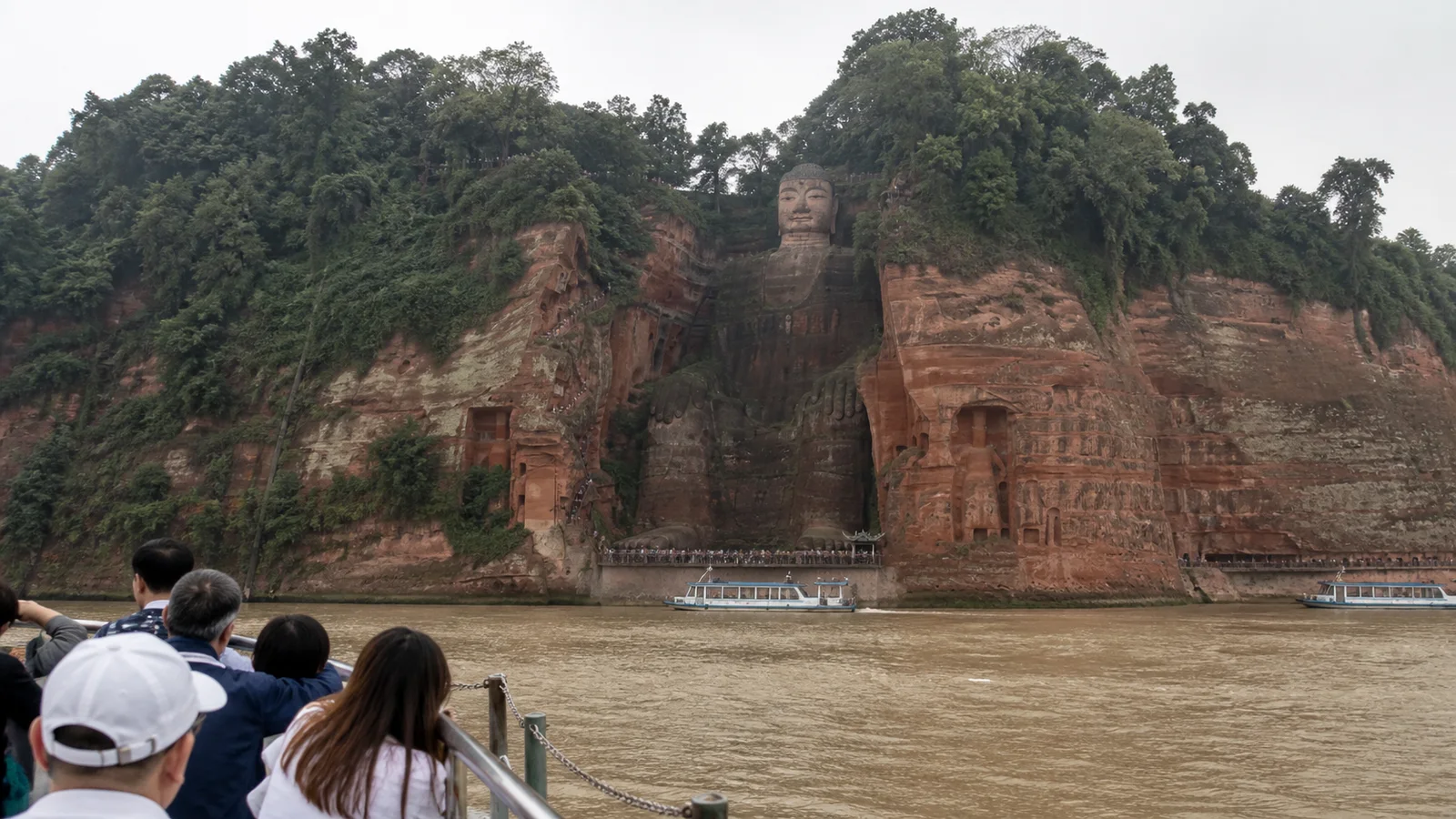 Leshan Giant Buddha viewed from a sightseeing boat on the river
