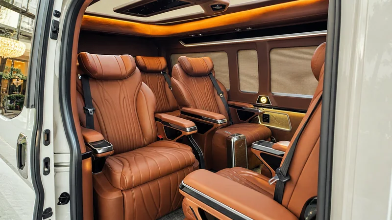 Brown coffee leather Toyota Hiace VIP cabin with Alphard-style reclining captain seats