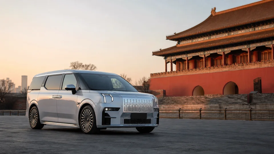 Silver ZEEKR 009 near Beijing's historic Central Axis at sunrise