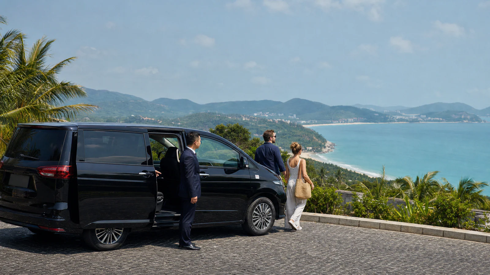 Private chauffeur and two travelers overlooking Yalong Bay during a Sanya itinerary